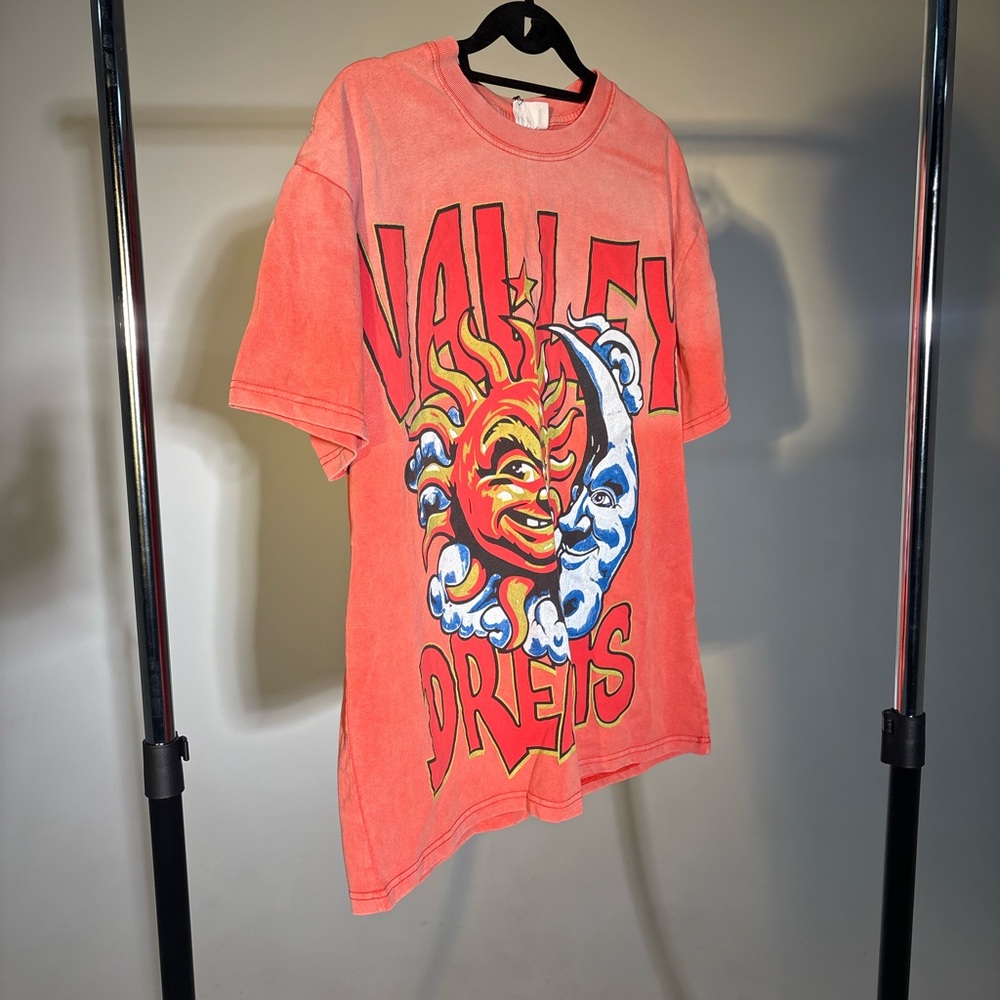 Vibrant Graphic Tee with Sun and Moon Design